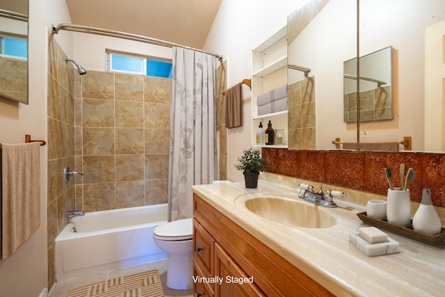 full bathroom with tile patterned flooring, shower / bath combination with curtain, toilet, and vanity