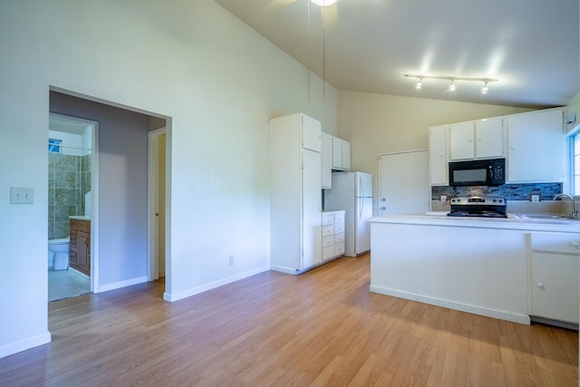 kitchen featuring white cabinetry, light hardwood / wood-style floors, stainless steel range with electric stovetop, and white refrigerator