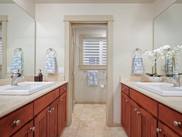 full bath featuring tile patterned flooring and vanity