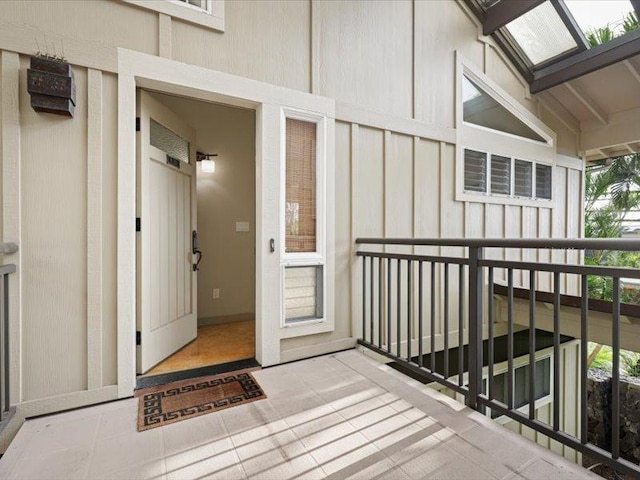 entrance to property featuring board and batten siding