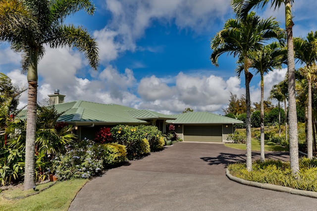 view of community with a garage