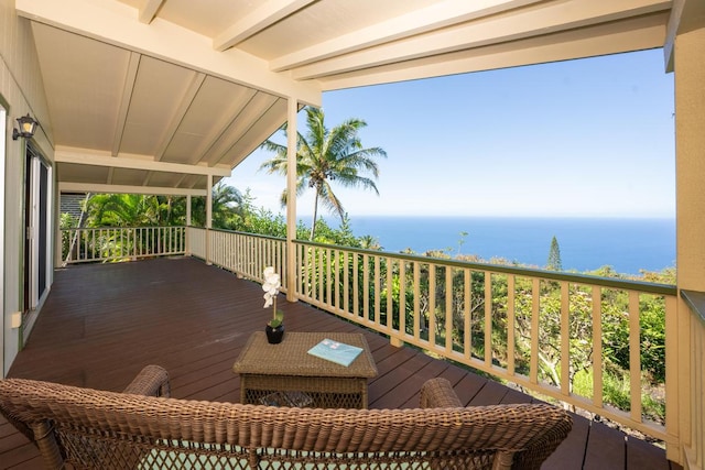 wooden deck featuring a water view