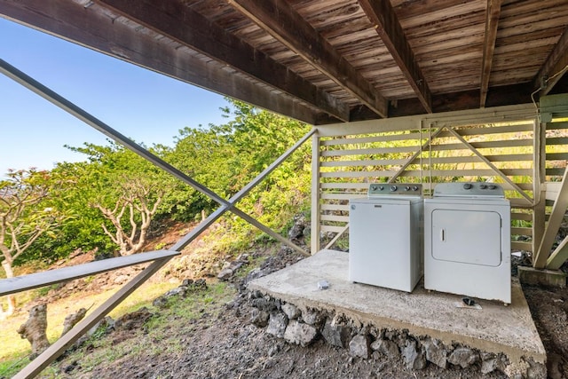 details featuring wood ceiling and washing machine and dryer