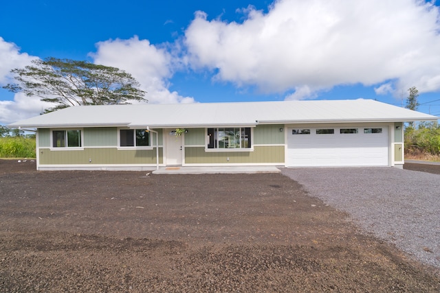 single story home featuring a garage