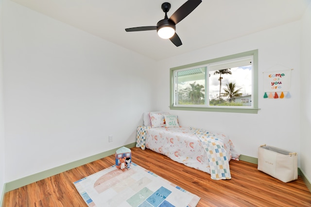 bedroom featuring wood-type flooring and ceiling fan