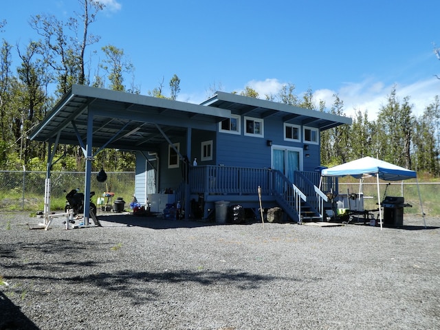 exterior space featuring a carport