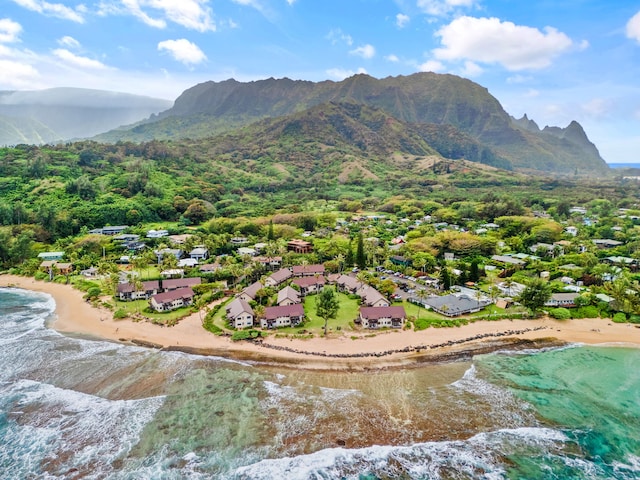 aerial view featuring a water and mountain view