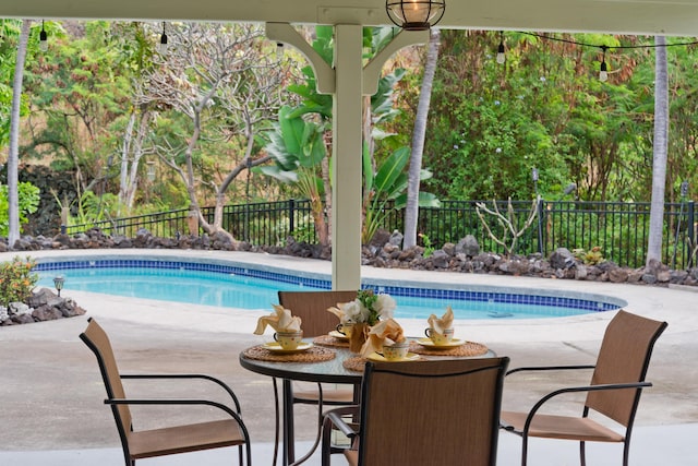 view of pool with a patio