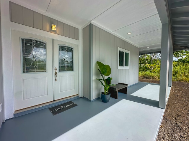 entrance to property featuring a patio