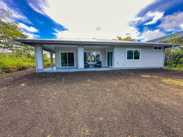 rear view of property with a patio