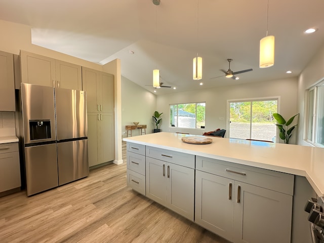 kitchen featuring gray cabinets, ceiling fan, and stainless steel fridge with ice dispenser