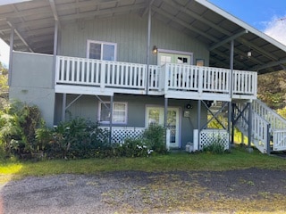 exterior space featuring a wooden deck