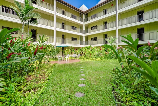 exterior space with a balcony and a patio area