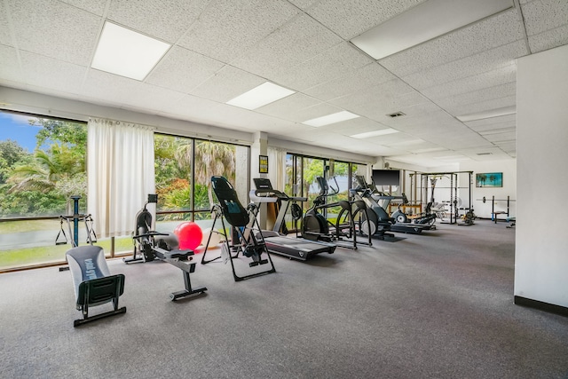 workout area with a drop ceiling