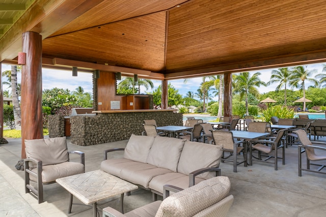 view of patio with a gazebo and outdoor lounge area