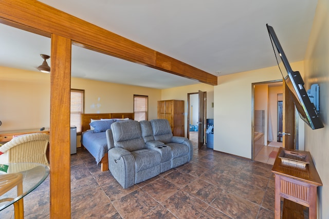 living room with beam ceiling