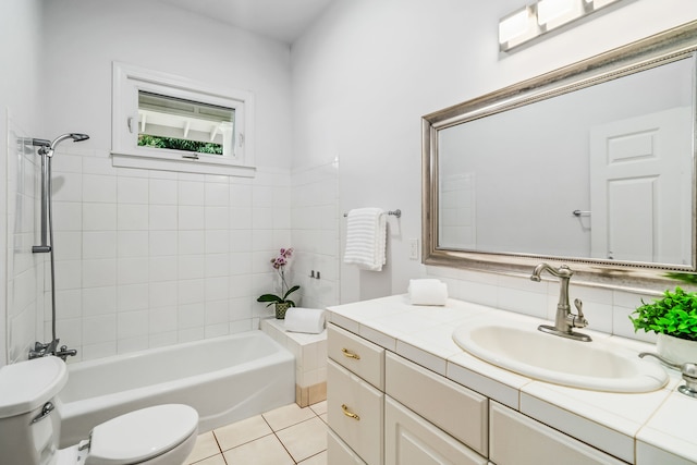 full bathroom with backsplash, toilet, tiled shower / bath, vanity, and tile patterned flooring