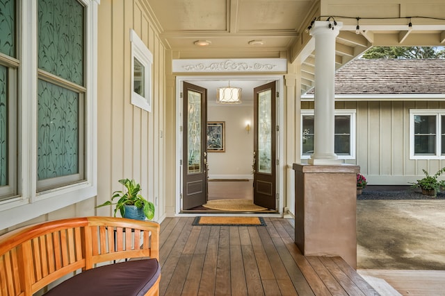 property entrance with covered porch