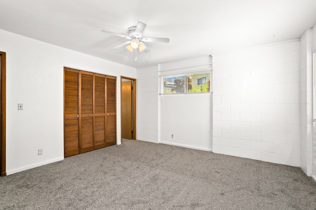 unfurnished bedroom with carpet floors and ceiling fan