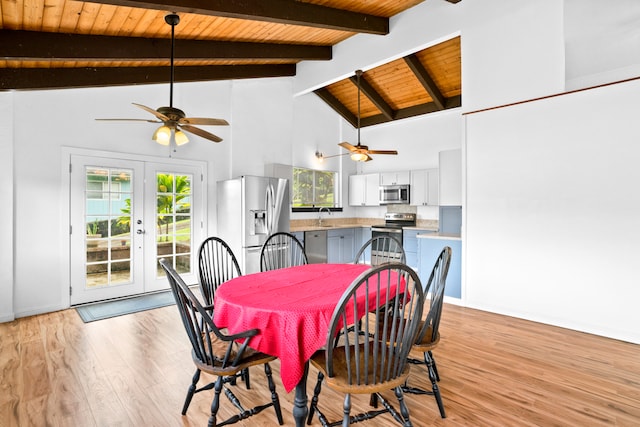 dining area with light wood-type flooring, french doors, wooden ceiling, beamed ceiling, and high vaulted ceiling