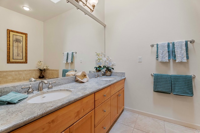 bathroom featuring vanity and tile patterned flooring