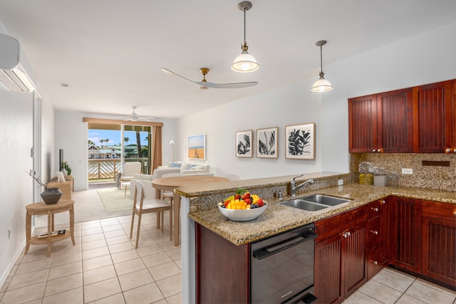 kitchen with kitchen peninsula, stainless steel dishwasher, and sink