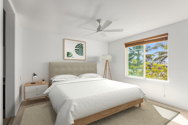 bedroom featuring ceiling fan and carpet floors