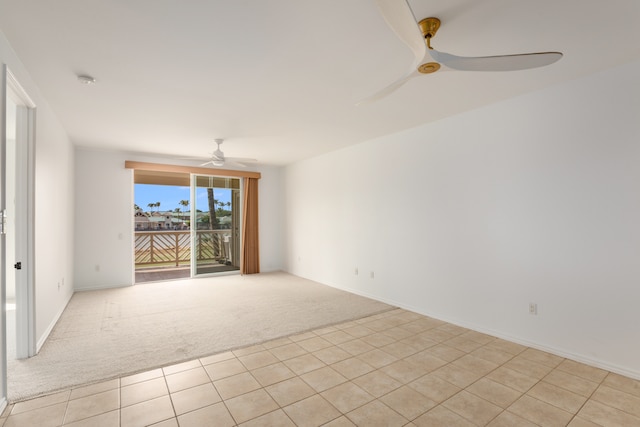 unfurnished room with light carpet and ceiling fan