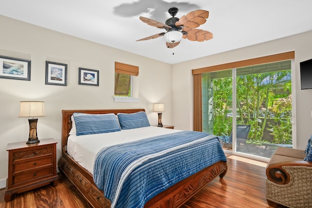 bedroom with access to exterior, a ceiling fan, and wood finished floors