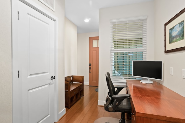 office area with baseboards, recessed lighting, and wood finished floors