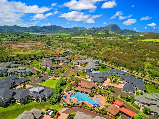 drone / aerial view featuring a residential view and a mountain view
