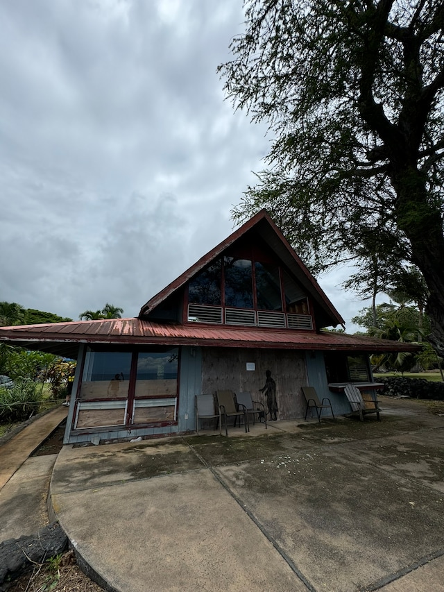 back of property with a patio area