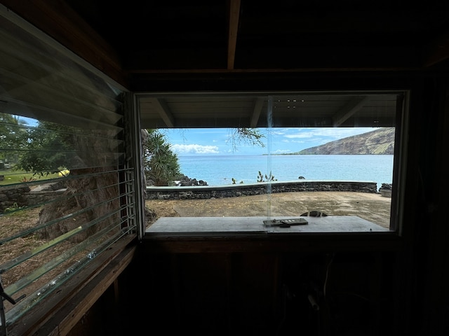 interior details featuring a water and mountain view