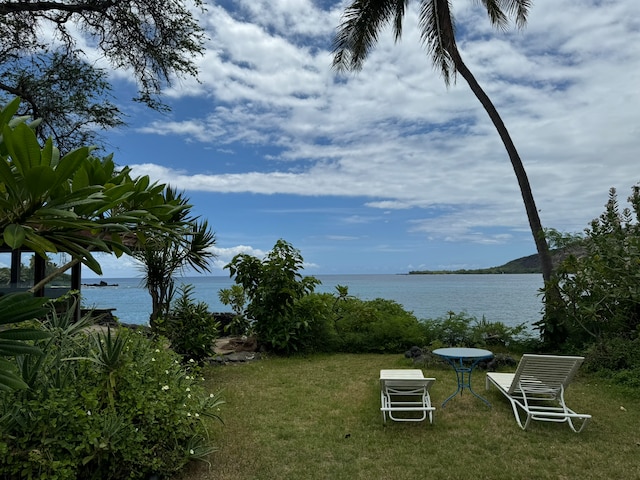 view of yard with a water view