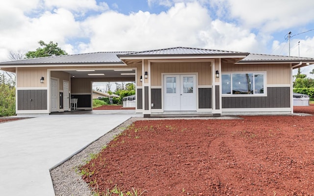 prairie-style home with a carport