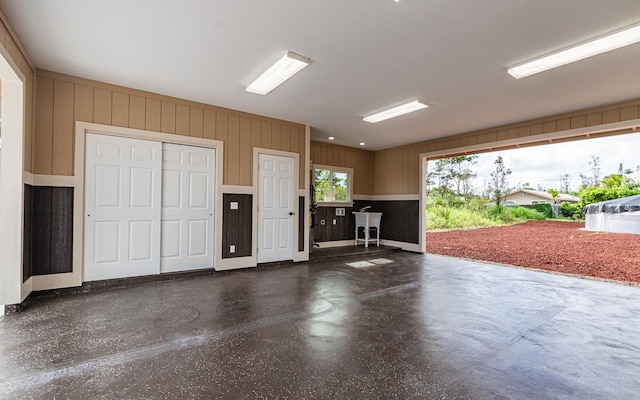 garage with wooden walls