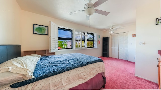 bedroom with carpet flooring, ceiling fan, and a closet