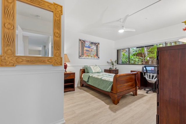 bedroom featuring light wood-type flooring and ceiling fan