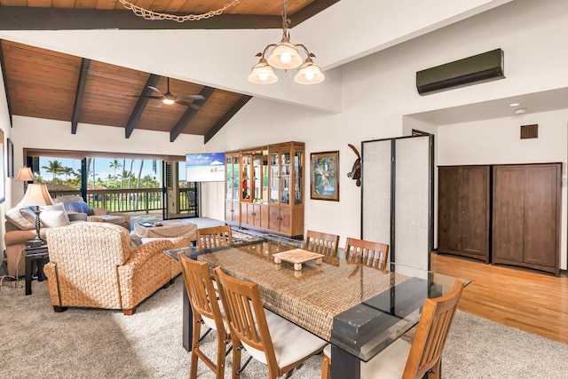 dining area with wood ceiling, light hardwood / wood-style floors, a wall unit AC, beam ceiling, and high vaulted ceiling