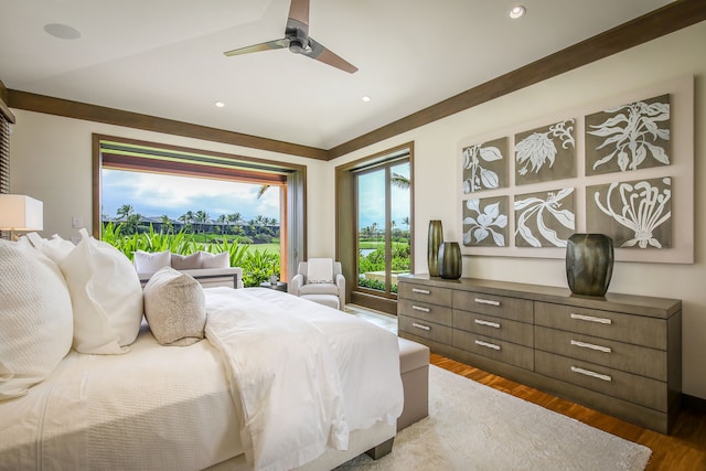 bedroom with wood-type flooring and ceiling fan