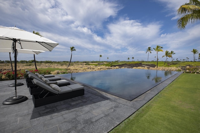 view of patio featuring a water view