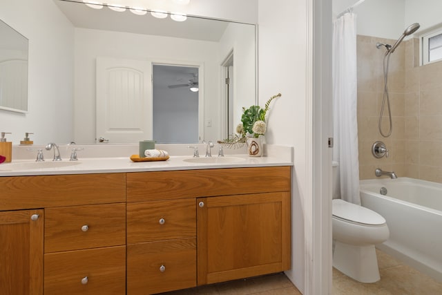 full bathroom with tile patterned flooring, vanity, toilet, and shower / tub combo