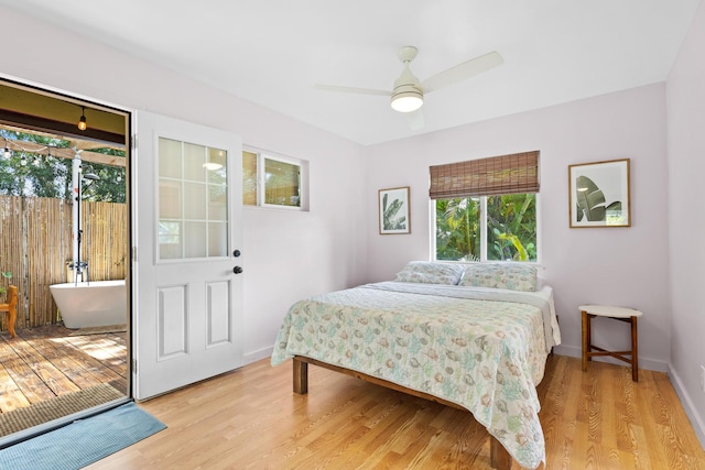 bedroom featuring ceiling fan and light hardwood / wood-style flooring