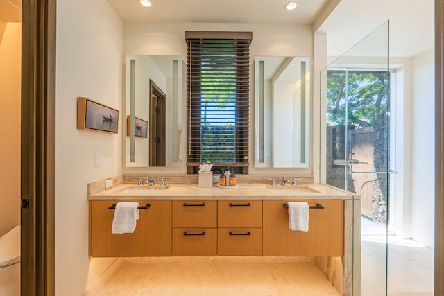 bathroom with tile patterned flooring and vanity