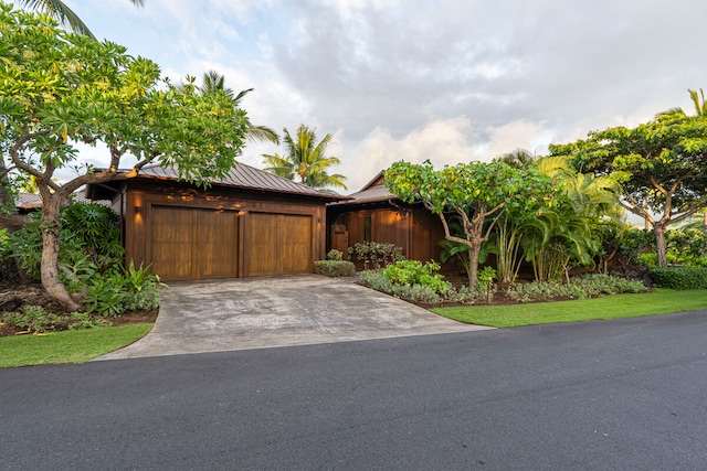 view of front of property with a garage