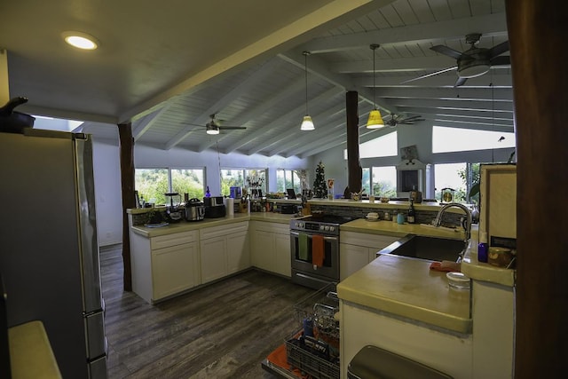 kitchen featuring sink, white cabinetry, kitchen peninsula, ceiling fan, and stainless steel appliances