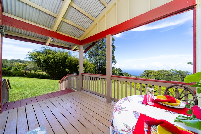 wooden deck with a yard