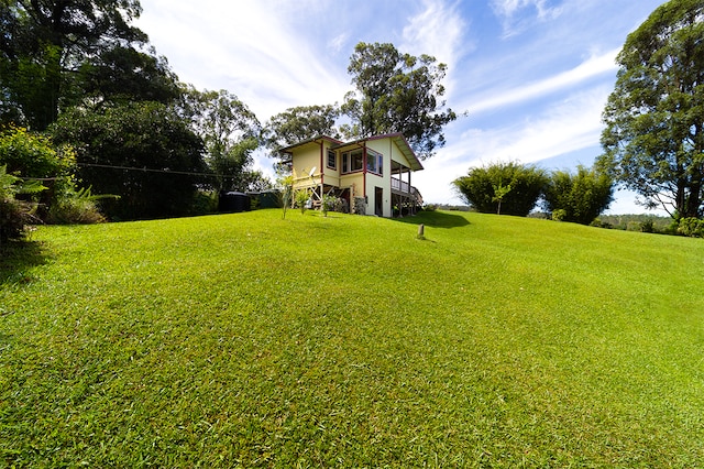 view of yard with a deck