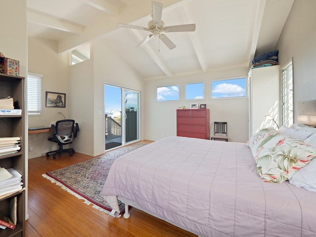 bedroom featuring access to exterior, hardwood / wood-style flooring, built in desk, lofted ceiling with beams, and ceiling fan