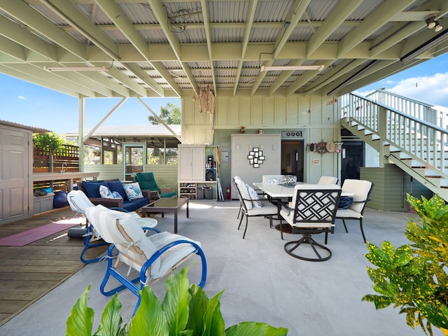 view of patio with a wooden deck and an outdoor hangout area